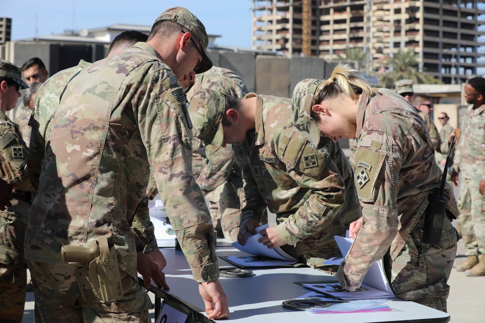 Soldiers receive the Norwegian foot march badge and certificate