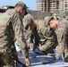 Soldiers receive the Norwegian foot march badge and certificate