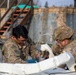 Soldiers with 10th Brigade Engineer Battalion, 1st Armored Brigade Combat Team, 3rd Infantry Division prepare equipment for the Mine Clearing Line Charge (MiC-LiC)