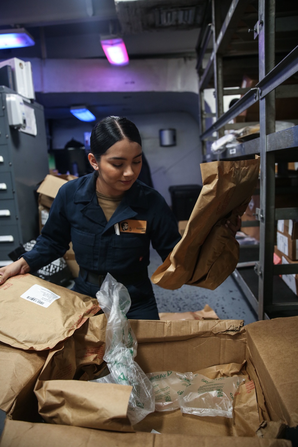 Abraham Lincoln Sailors conduct inventory