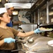 Abraham Lincoln Sailors serve food