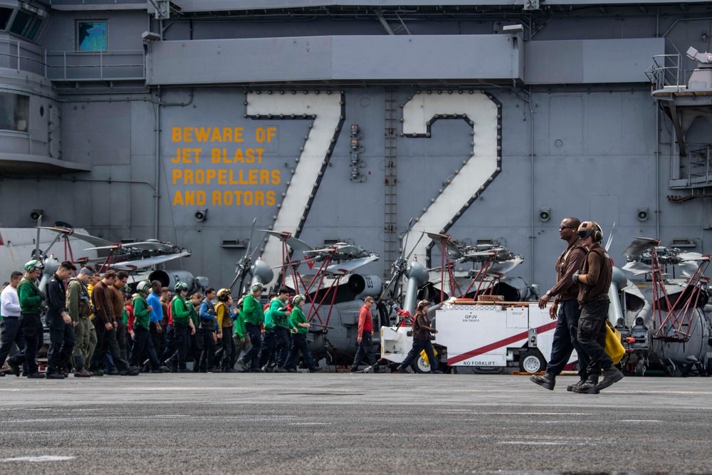 Abraham Lincoln Sailors conduct a FOD walkdown