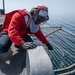 Professional Apprenticeship Career Tract (PACT) Seaman Benjahmin Boie, from Baltimore, Md., lowers safety netting