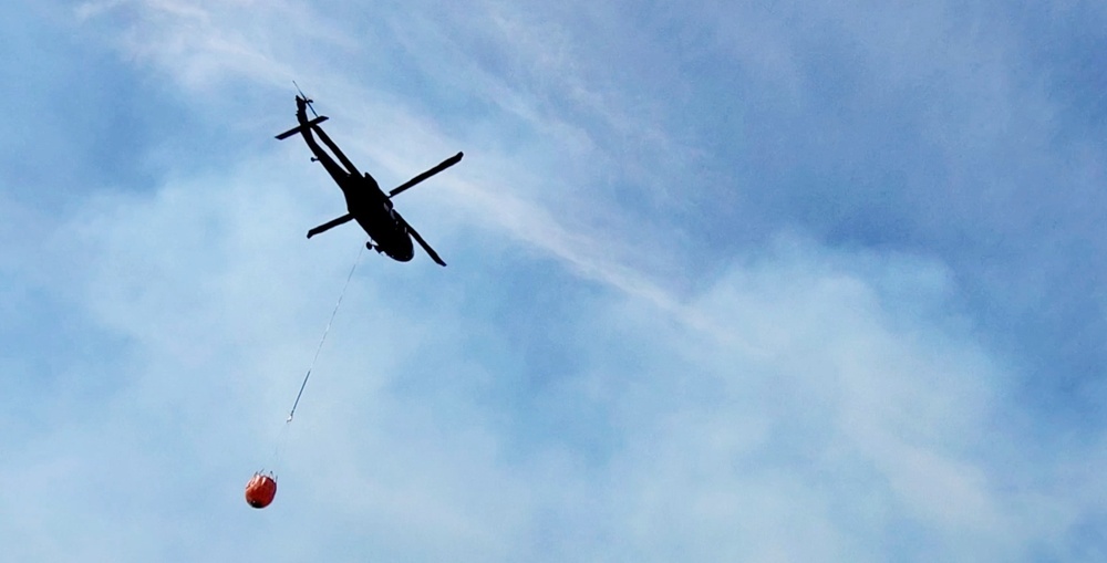 Federal, state agencies partner for fire-suppression training with UH-60 Black Hawks at Fort McCoy