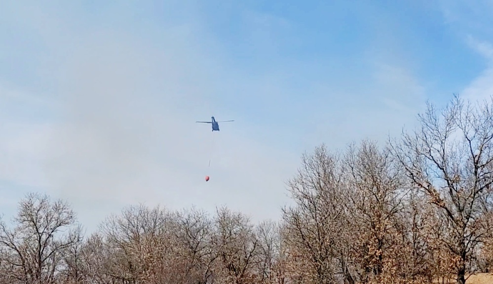 Federal, state agencies partner for fire-suppression training with UH-60 Black Hawks at Fort McCoy