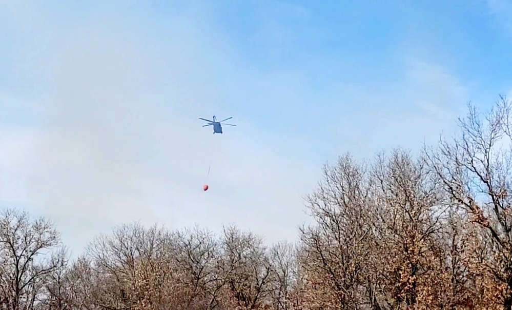 Federal, state agencies partner for fire-suppression training with UH-60 Black Hawks at Fort McCoy