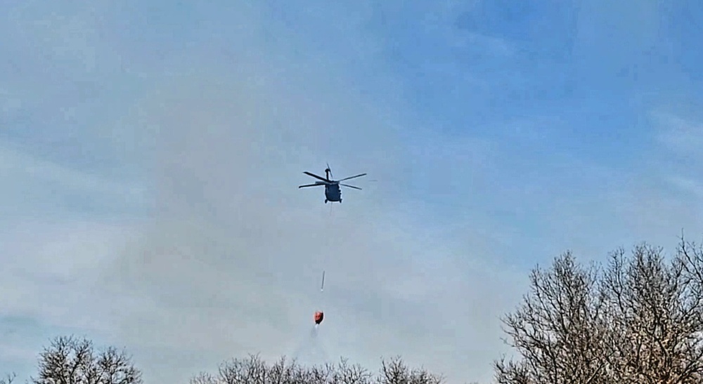 Federal, state agencies partner for fire-suppression training with UH-60 Black Hawks at Fort McCoy