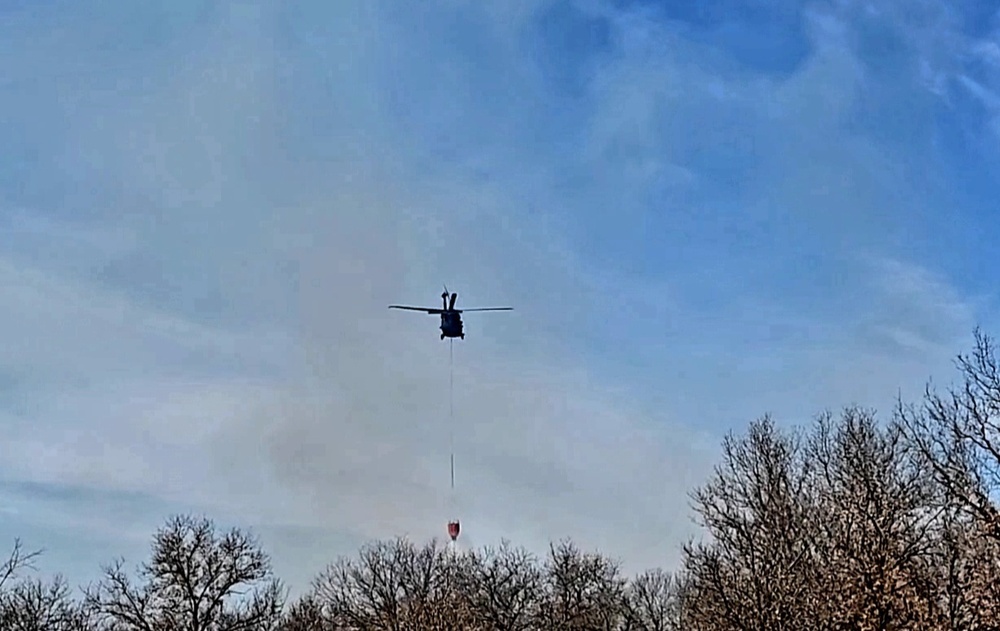 Federal, state agencies partner for fire-suppression training with UH-60 Black Hawks at Fort McCoy