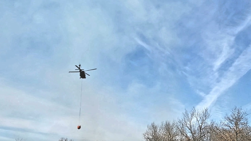 Federal, state agencies partner for fire-suppression training with UH-60 Black Hawks at Fort McCoy