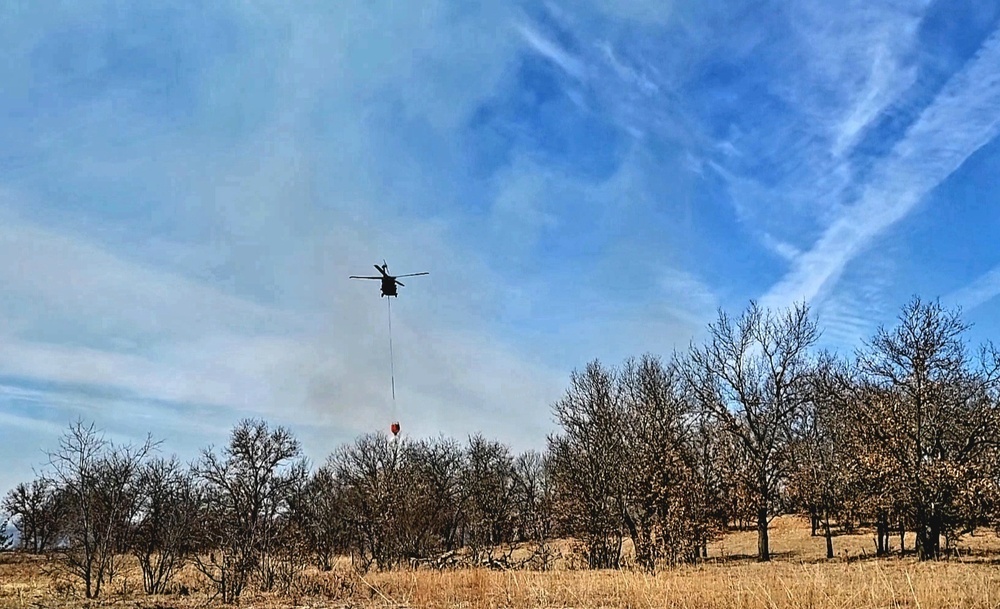 Federal, state agencies partner for fire-suppression training with UH-60 Black Hawks at Fort McCoy