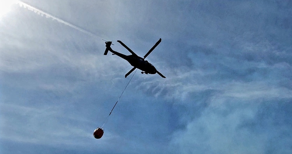 Federal, state agencies partner for fire-suppression training with UH-60 Black Hawks at Fort McCoy