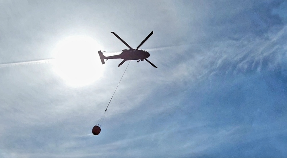 Federal, state agencies partner for fire-suppression training with UH-60 Black Hawks at Fort McCoy