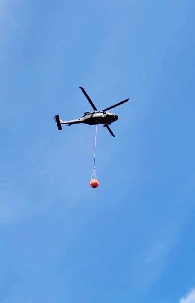 Federal, state agencies partner for fire-suppression training with UH-60 Black Hawks at Fort McCoy