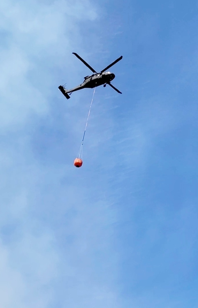 Federal, state agencies partner for fire-suppression training with UH-60 Black Hawks at Fort McCoy