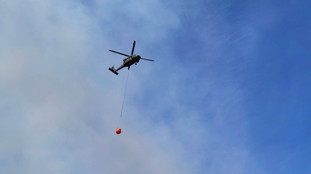 Federal, state agencies partner for fire-suppression training with UH-60 Black Hawks at Fort McCoy