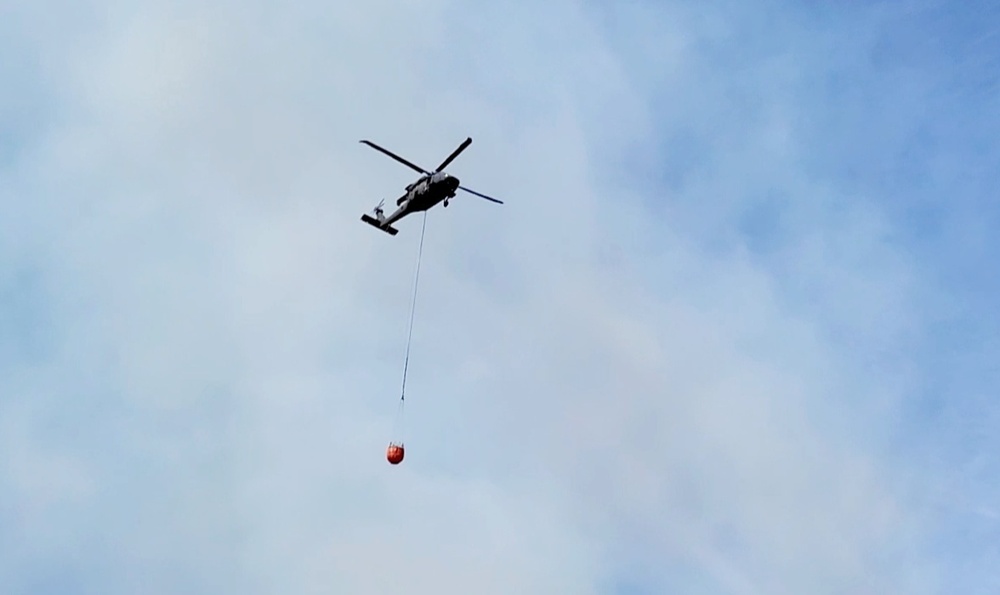 Federal, state agencies partner for fire-suppression training with UH-60 Black Hawks at Fort McCoy