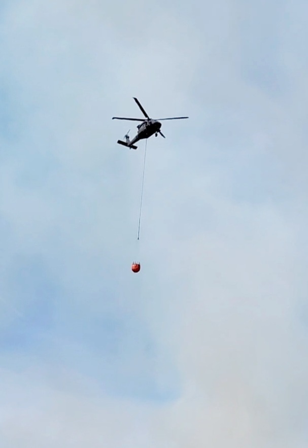 Federal, state agencies partner for fire-suppression training with UH-60 Black Hawks at Fort McCoy