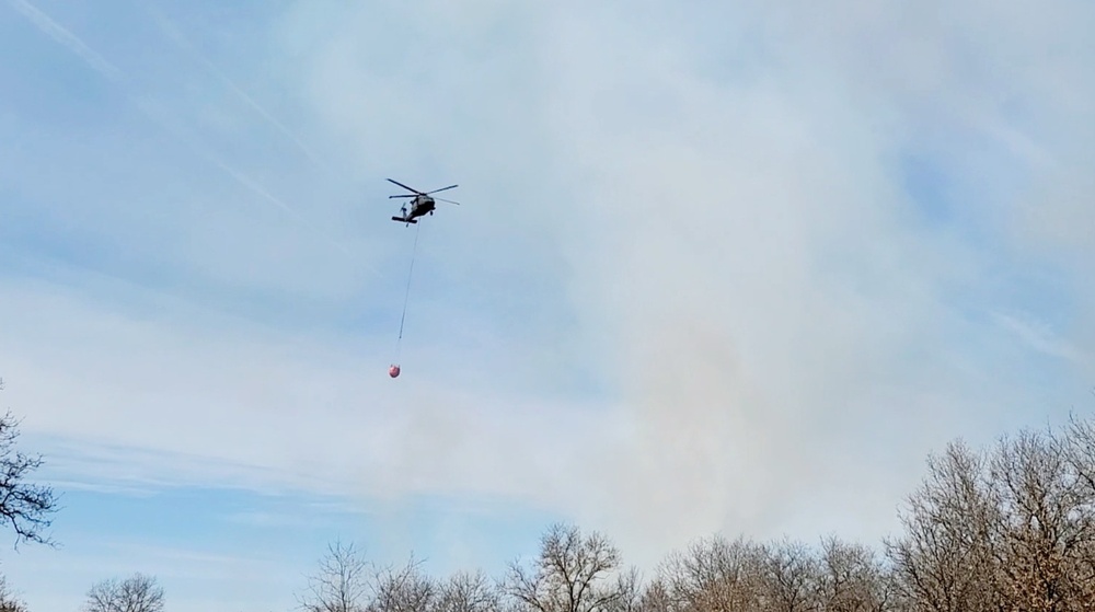 Federal, state agencies partner for fire-suppression training with UH-60 Black Hawks at Fort McCoy