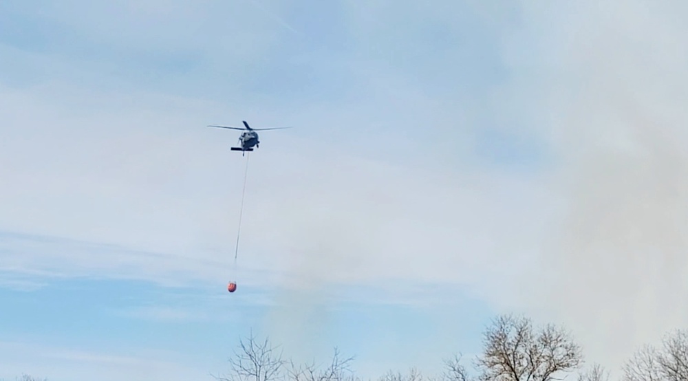 Federal, state agencies partner for fire-suppression training with UH-60 Black Hawks at Fort McCoy