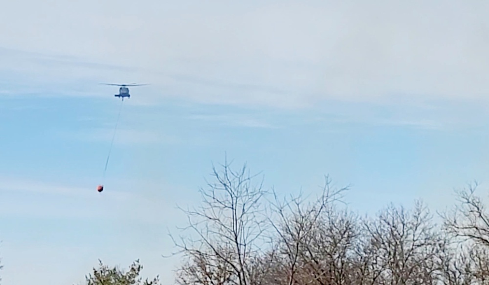 Federal, state agencies partner for fire-suppression training with UH-60 Black Hawks at Fort McCoy