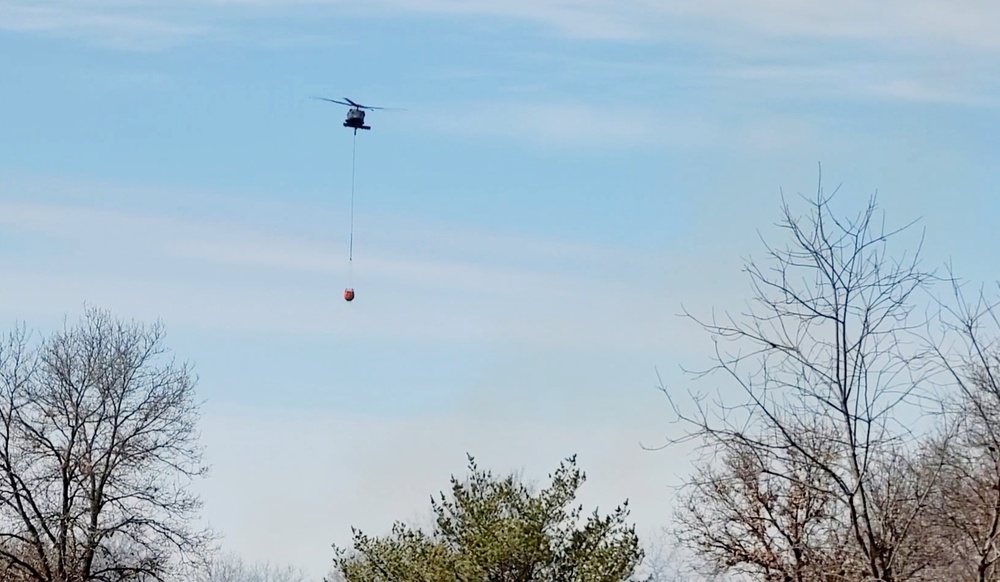 Federal, state agencies partner for fire-suppression training with UH-60 Black Hawks at Fort McCoy