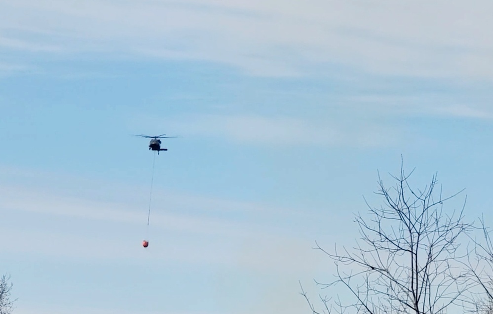 Federal, state agencies partner for fire-suppression training with UH-60 Black Hawks at Fort McCoy