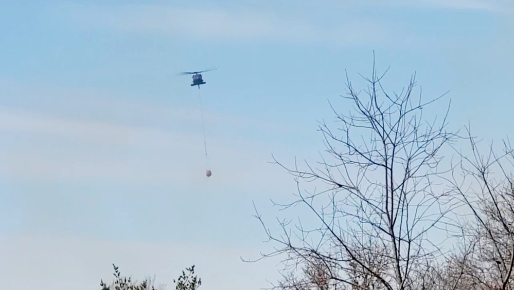 Federal, state agencies partner for fire-suppression training with UH-60 Black Hawks at Fort McCoy