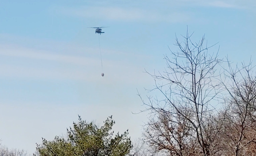 Federal, state agencies partner for fire-suppression training with UH-60 Black Hawks at Fort McCoy