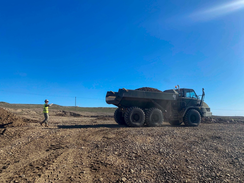 NMCB THREE and ACB 1 Seabees work together to excavate San Clemente Island.