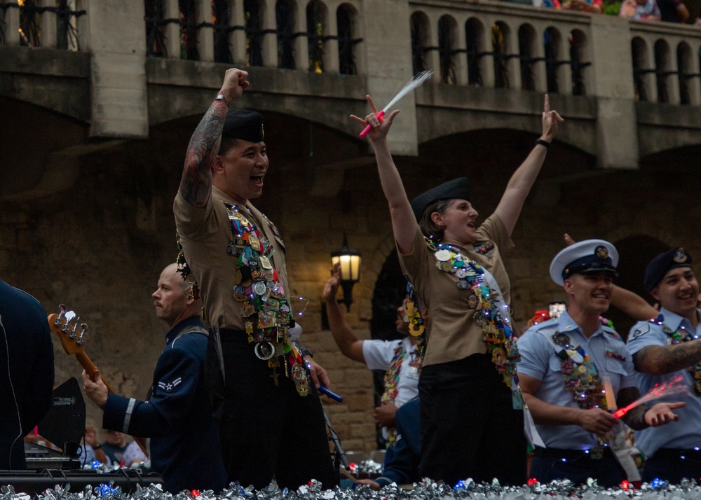 The Texas Cavaliers River Parade occurs at the Riverwalk