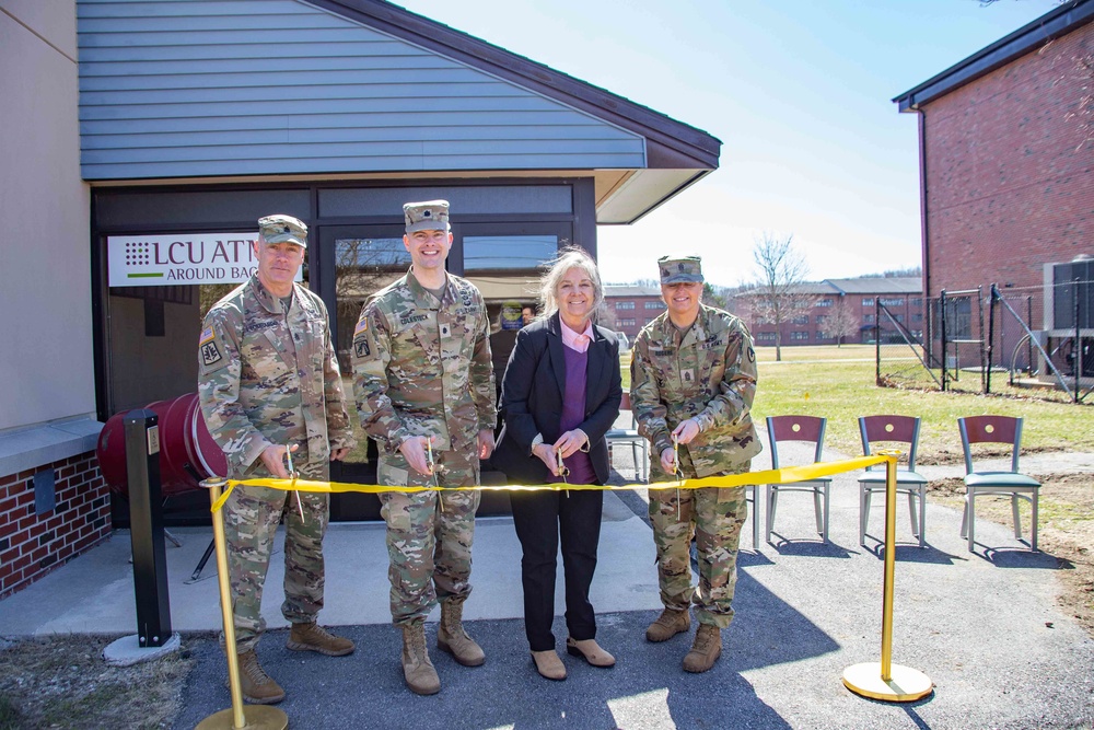 CSM Lombardo, LTC Colestock, Mrs. Eileen (Artesani) Sullivan and CSM Rogers cut the Ribbon at the official opening of the Artesani Warrior Restaurant.