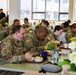 Soldiers taking a break from drill to enjoy lunch at the new Artesani Warrior Restaurant.