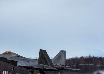 F-22s take off from Ted Stevens during PF 22-4