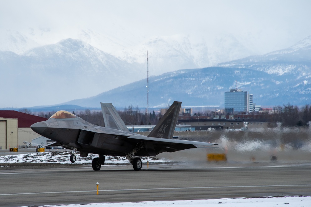 F-22s take off from Ted Stevens during PF 22-4