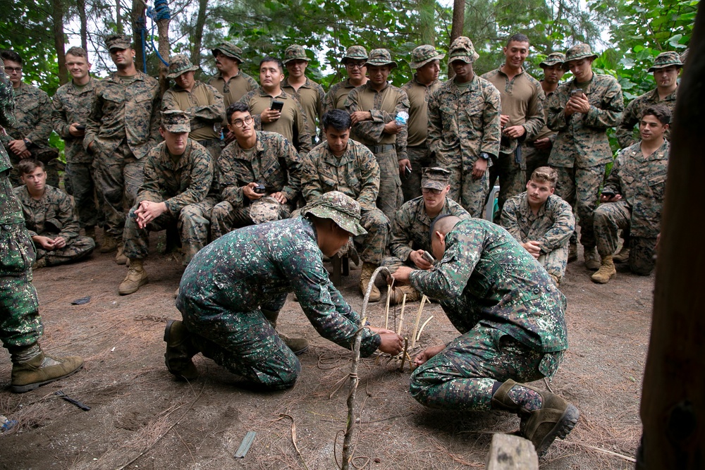 Balikatan 22 - Philippine Marines demonstrate field cooking techniques