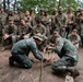 Balikatan 22 - Philippine Marines demonstrate field cooking techniques