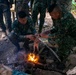 Balikatan 22 - Philippine Marines demonstrate field cooking techniques