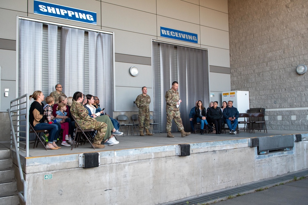 Lt. Col. Shaun Cruze, commander of the 152nd Logistics Readiness Squadron, speaks during roll call