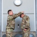 Col. Brian Gunderson, Nevada Air National Guard Director of Staff-Air awards the Maj. Gen. Drennan A. Clark Order of Nevada to Senior Master Sgt. Rommie Brown