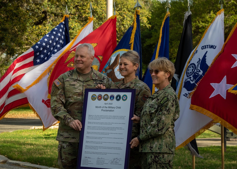 Leadership of JBSA sign the proclamation of Month of the Military Child