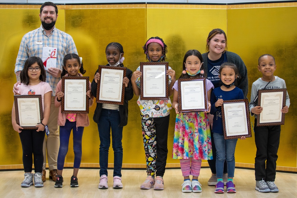 Artists in Training: School Age Care personnel awards winners of school art contest