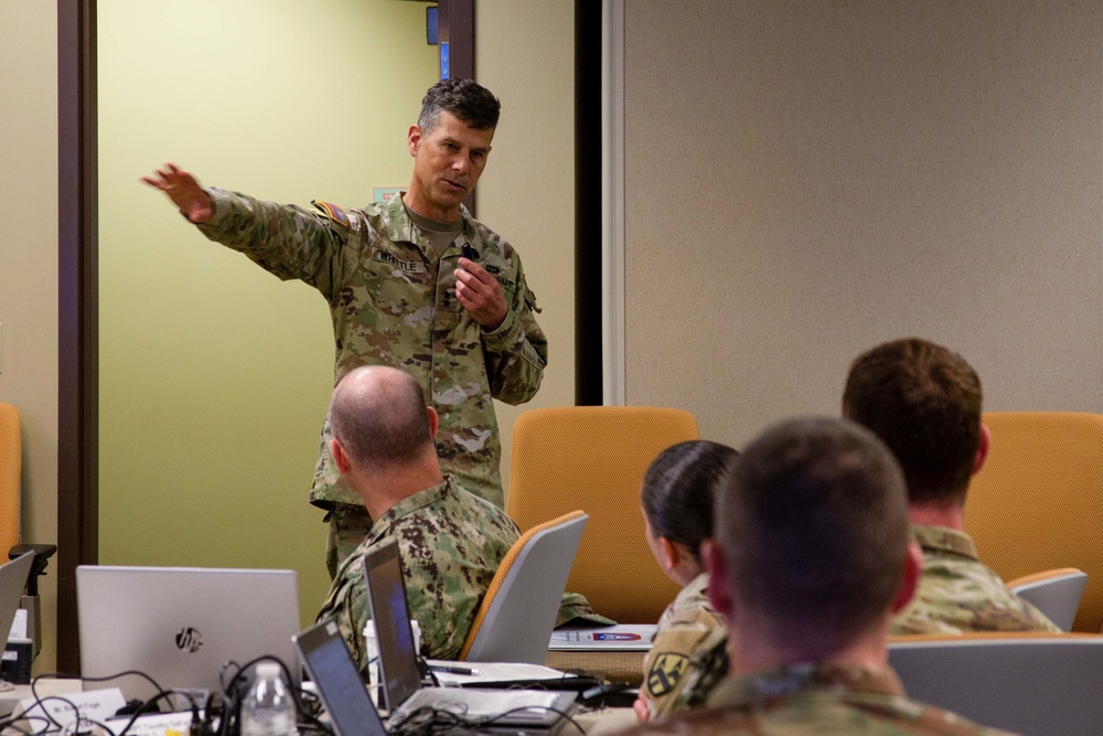 Maj. Gen. Robert Whittle gives remarks during DSCA Phase II course