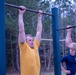 CDR John B. Horn Performs Pull-Ups During a PST.