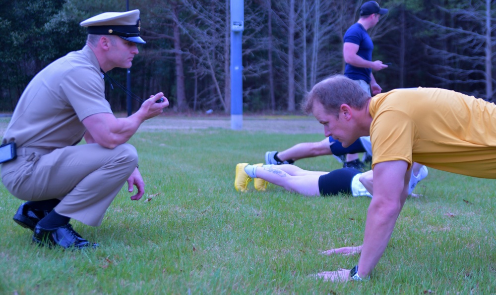 CDR John B. Horn Performs Push-Ups During a PST.