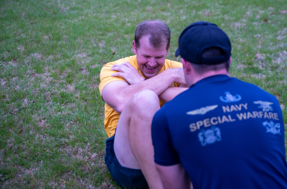 CDR John B. Horn Performs Sit-Ups During a PST.