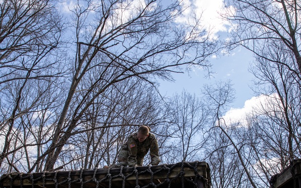 883 QM Company conquers Kentucky confidence course