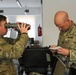 Soldiers of Bravo Company Conduct PMCS on Ancillary Equipment