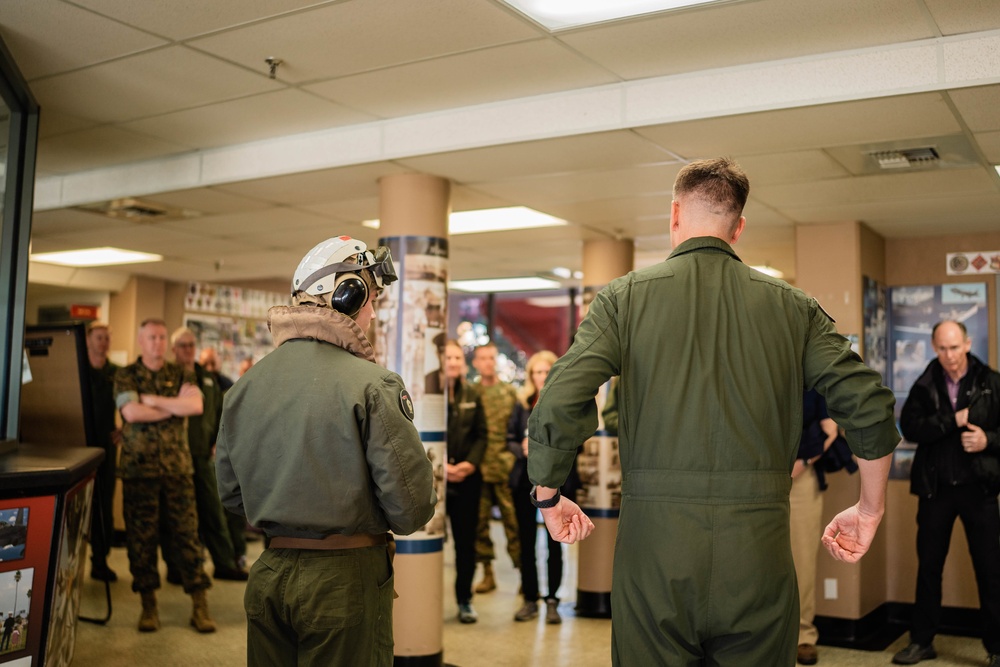 Distinguished Visitors depart to USS Tripoli