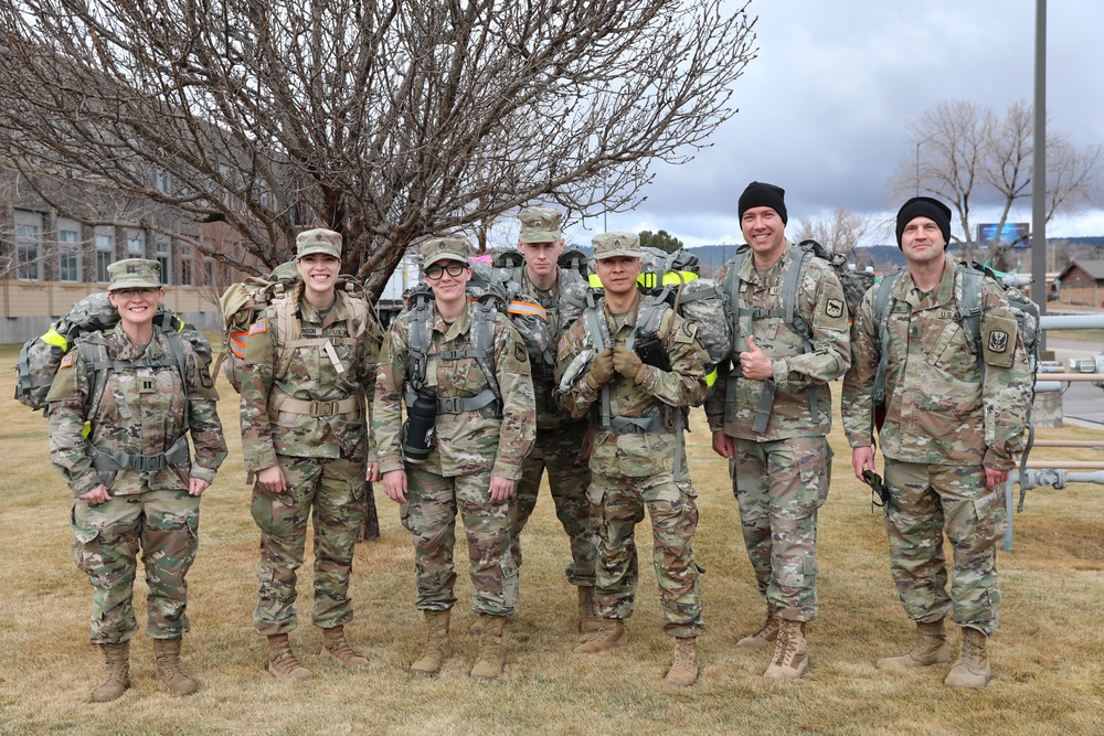 Soldiers from the 129th MPAD complete ruck march for the Keith L. Ware Award requirement