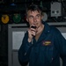 Rear Adm. Curt Renshaw, commander of Carrier Strike Group (CSG) 8, addresses the crew over the 1-MC